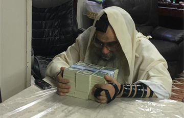 Misaskimâ€™s Chanukah Distribution Turns Darkness into Light For 2,100 Yesomim